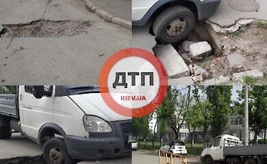В столице грузовик по самый бампер провалился в яму