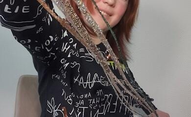 Довжина нігтів 2 метри: майстер манікюру йде на рекорд