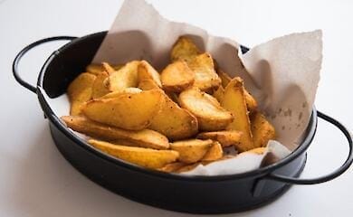 Молодой картофель, запеченный с сыром: простой рецепт
