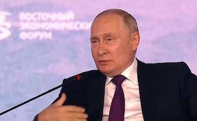 Путин